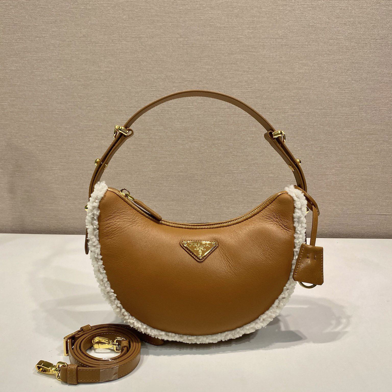 Pra*a top handle bags